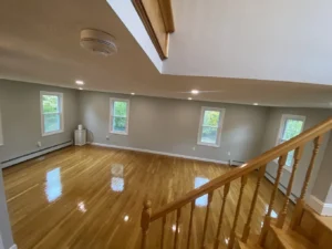 Restoration painting contractors preparing a historic Victorian home interior in Greater Boston